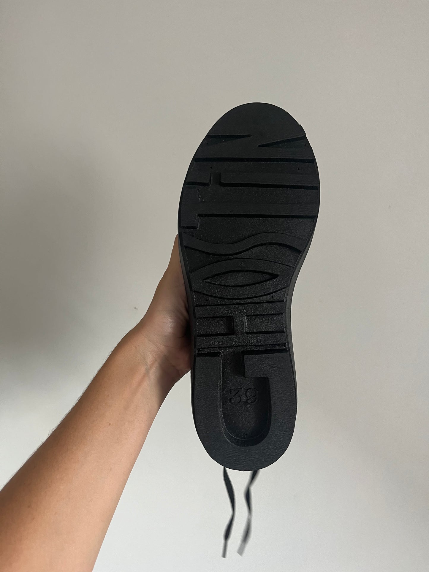 Futuristic black sneakers